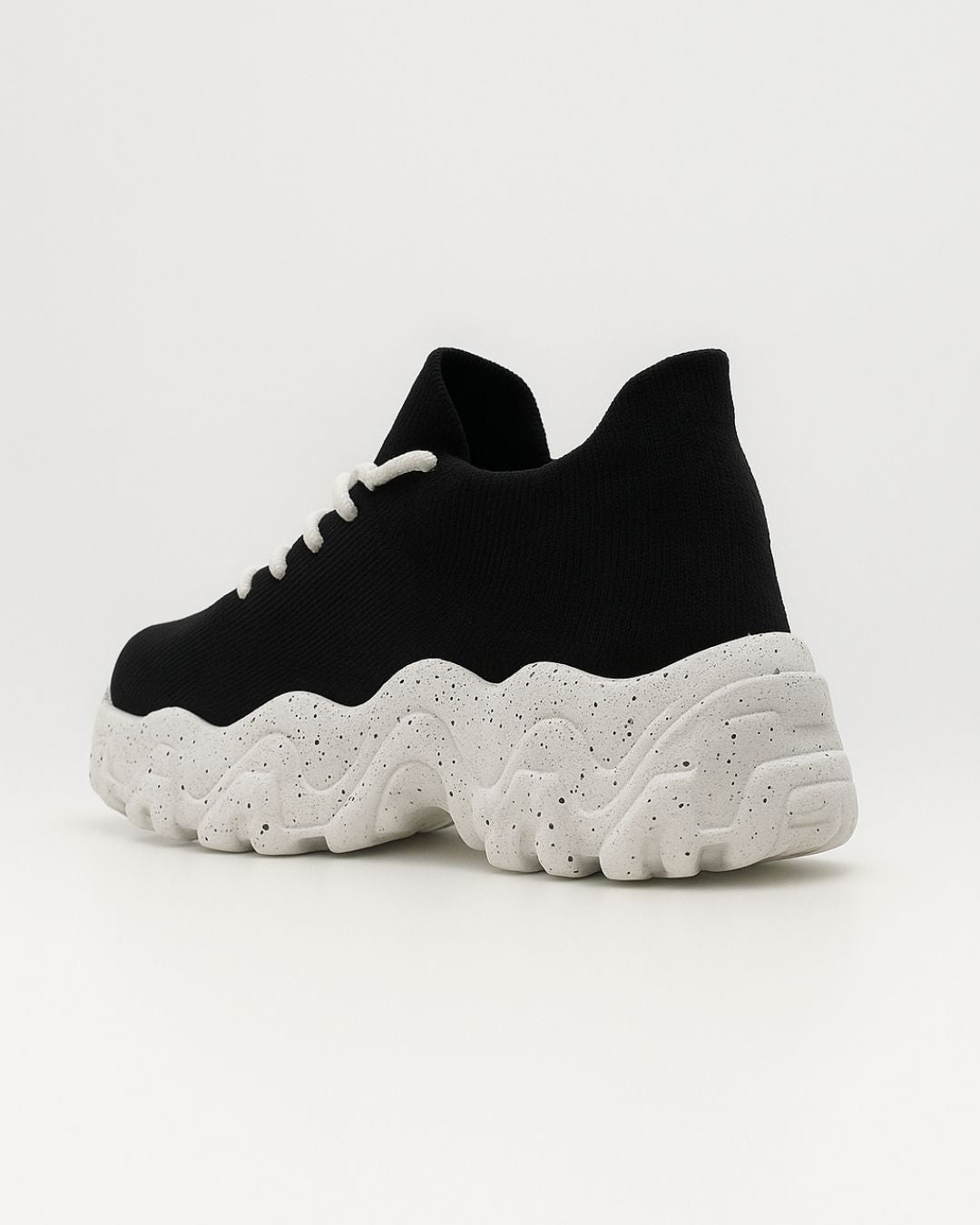 Rear angled view of OrthoEase Luxe Oreo sneaker