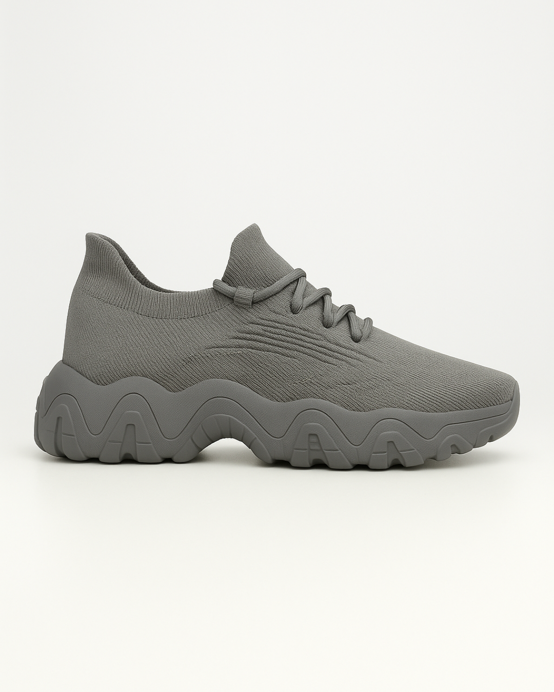 Left side of OrthoEase Luxe Silver sneaker with grey knit finish